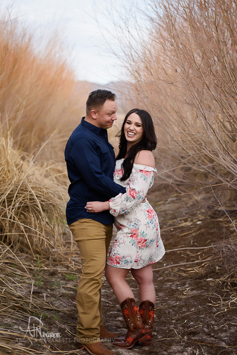 couples portraits session texas embrace laughing